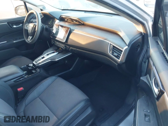 2018 Honda Clarity with VIN JHMZC5F15JC018312, listed as a IAAI auction lot 41354648 with 97,035 mi miles and . Bid and sale history available at DreamBid. Image 5.
