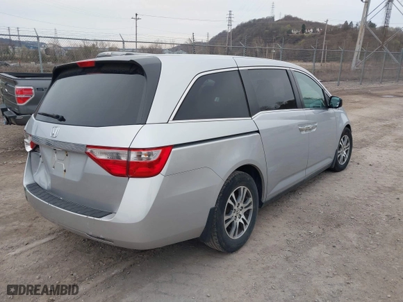 2011 Honda Odyssey EX-L with VIN 5FNRL5H61BB004096, listed as a IAAI auction lot 41917946 with 142,005 mi miles. Bid and sale history available at carsss.com. Image 4.