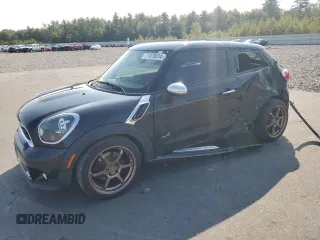 2014 MINI Paceman S with VIN WMWSS7C58EWN70428, listed as a Copart auction lot 71078514 with 90,578 mi miles and Salvage Title. Bid and sale history available at DreamBid. Image 1.