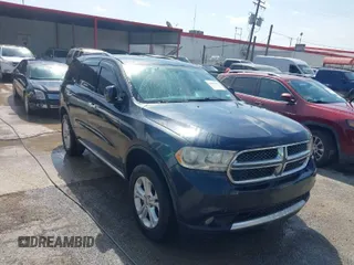 2013 Dodge Durango Crew with VIN 1C4RDHDG6DC665135, listed as a IAAI auction lot 41994158 with 213,891 mi miles. Bid and sale history available at carsss.com. Image 1.