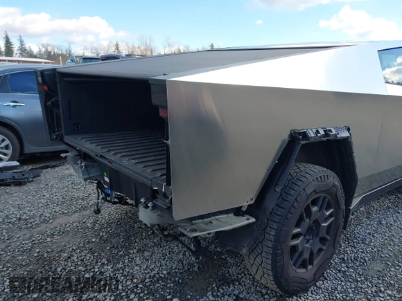 2024 Tesla Cybertruck with VIN 7G2CEHED8RA015749, listed as a IAAI auction lot 41731902 with 13,822 mi miles. Bid and sale history available at carsss.com. Image 6.