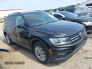 2020 Volkswagen Tiguan S with VIN 3VV1B7AX1LM086019, listed as a IAAI auction lot 42458434 with 114,413 mi miles and . Bid and sale history available at DreamBid. Image 1.