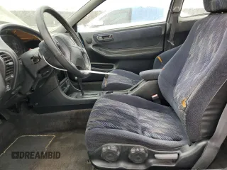 2000 Acura Integra LS with VIN JH4DC4454YS006940, listed as a Copart auction lot 54518205 with 191,509 mi miles and Salvage title. Bid and sale history available at DreamBid. Image 7.