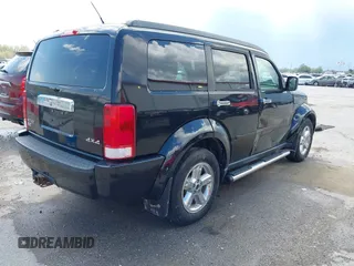 2007 Dodge Nitro SLT with VIN 1D8GU58K97W679278, listed as a IAAI auction lot 42014211 with 213,451 mi miles and . Bid and sale history available at carsss.com. Image 4.