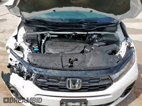 2025 Honda Odyssey Touring with VIN 5FNRL6H88SB001428, listed as a Copart auction lot 53836615 with 14,580 mi miles and Salvage title. Bid and sale history available at DreamBid. Image 12.