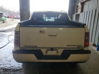 2010 Honda Ridgeline RTL with VIN 5FPYK1F57AB502049, listed as a Copart auction lot 87058684 with 228,156 mi miles and Clean Title. Bid and sale history available at carsss.com. Image 6.