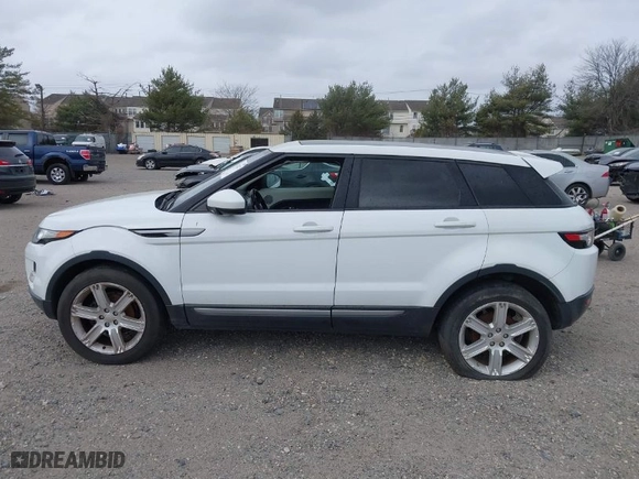 2015 Land Rover Range Rover Evoque Pure Plus with VIN SALVP2BG5FH964975, listed as a IAAI auction lot 41714227 with 100,315 mi miles. Bid and sale history available at carsss.com. Image 14.