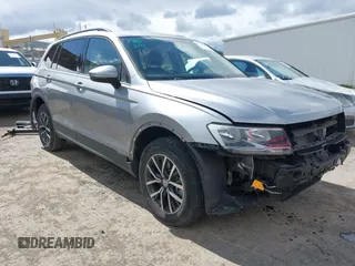 2021 Volkswagen Tiguan S with VIN 3VV1B7AX1MM070775, listed as a IAAI auction lot 41788112 with 22,107 mi miles and . Bid and sale history available at DreamBid. Image 1.