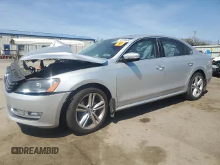 2015 Volkswagen Passat SE with VIN 1VWBT7A35FC120074, listed as a Copart auction lot 53293665 with 143,552 mi miles and Salvage title. Bid and sale history available at DreamBid. Image 1.