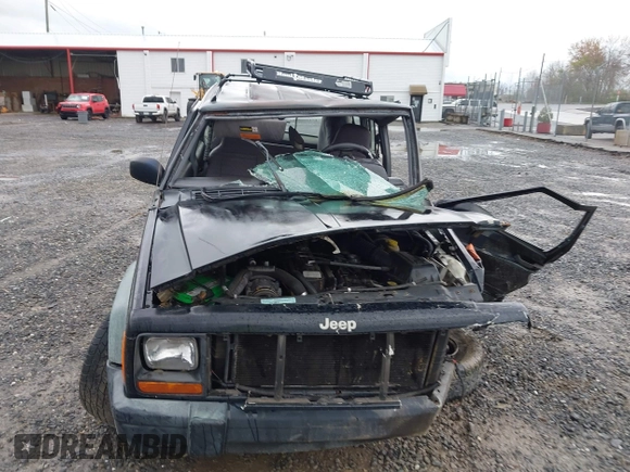 1998 Jeep Cherokee Sport z VIN 1J4FJ68S7WL264849, wystawiony jako IAAI lot #41931068 z przebiegiem Nie podano mil oraz . Historia ofert i sprzedaży dostępna na DreamBid. Obrazek 12.