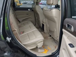 2015 Jeep Grand Cherokee Overland with VIN 1C4RJECG3FC152601, listed as a IAAI auction lot 42414340 with 139,315 mi miles and . Bid and sale history available at DreamBid. Image 8.