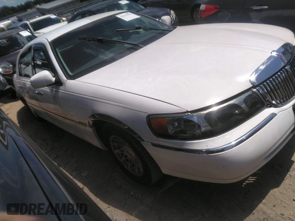 1998 Lincoln Town Car Signature with VIN 1LNFM82W4WY672955, listed as a IAAI auction lot 42211994 with 162,058 mi miles and . Bid and sale history available at DreamBid. Image 1.