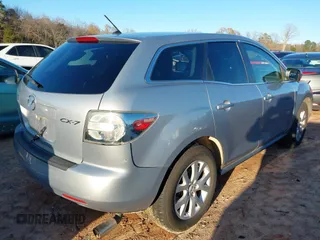 2009 Mazda CX-7 Sport with VIN JM3ER293290221298, listed as a IAAI auction lot 41067088 with 230,241 mi miles. Bid and sale history available at carsss.com. Image 4.