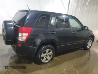 2011 Suzuki Grand Vitara Premium with VIN JS3TD0D28B4102673, listed as a Copart auction lot 43216005 with 141,726 mi miles and Salvage title. Bid and sale history available at DreamBid. Image 3.
