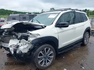 2019 Honda Passport Elite with VIN 5FNYF8H0XKB005151, listed as a IAAI auction lot 42322644 with 124,274 mi miles and . Bid and sale history available at DreamBid. Image 2.