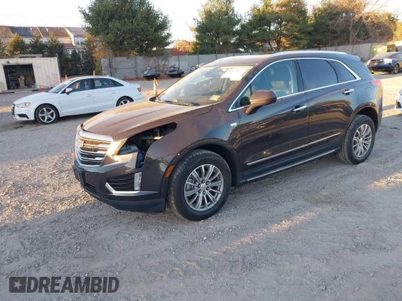2017 Cadillac XT5 Luxury AWD with VIN 1GYKNDRS5HZ319787, listed as a IAAI auction lot 40819077 with 83,510 mi miles and . Bid and sale history available at DreamBid. Image 18.