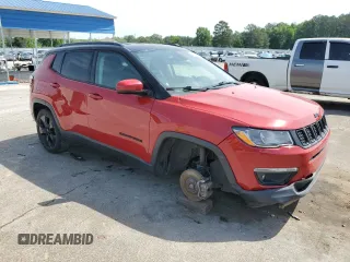 2020 Jeep Compass Latitude with VIN 3C4NJCBB0LT129253, listed as a Copart auction lot 57037305 with 136,006 mi miles and Salvage title. Bid and sale history available at DreamBid. Image 4.