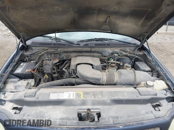 2002 Ford F-150 XL with VIN 2FTPX18L32CA67220, listed as a IAAI auction lot 42077154 with 233,409 mi miles. Bid and sale history available at carsss.com. Image 10.