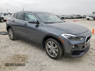 2018 BMW X2 sDrive28i with VIN WBXYJ3C38JEJ91570, listed as a Copart auction lot 57483525 with 40,790 mi miles and Salvage title. Bid and sale history available at DreamBid. Image 4.