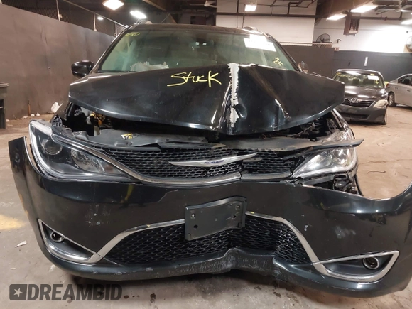 2020 Chrysler Pacifica Touring L with VIN 2C4RC1BG2LR280156, listed as a IAAI auction lot 42182406 with 105,038 mi miles and . Bid and sale history available at DreamBid. Image 12.
