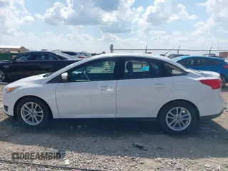 2015 Ford Focus SE with VIN 1FADP3F2XFL335884, listed as a IAAI auction lot 42582740 with 102,036 mi miles and . Bid and sale history available at DreamBid. Image 14.