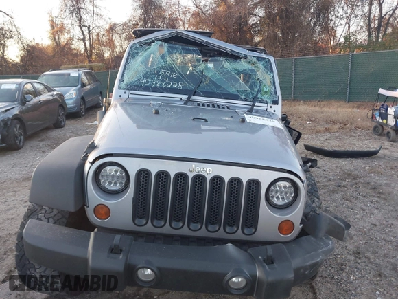 2018 Jeep Wrangler JK Unlimited Sport S with VIN 1C4BJWDG5JL862100, listed as a IAAI auction lot 40986228 with 1 mi miles. Bid and sale history available at carsss.com. Image 13.