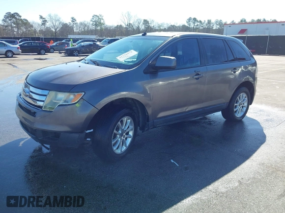 2010 Ford Edge SEL with VIN 2FMDK3JCXABA50115, listed as a IAAI auction lot 41758678 with 207,033 mi miles. Bid and sale history available at carsss.com. Image 2.