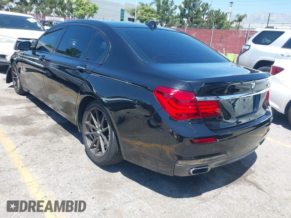 2014 BMW 7 Series ALPINA B7 z VIN WBAYE8C54ED134615, wystawiony jako IAAI lot #42197002 z przebiegiem 126 805 mil mil oraz . Historia ofert i sprzedaży dostępna na DreamBid. Obrazek 3.