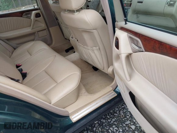 1998 Mercedes-Benz E-Class with VIN WDBJF65FXWA589630, listed as a IAAI auction lot 41990725 with 102,149 mi miles. Bid and sale history available at carsss.com. Image 8.