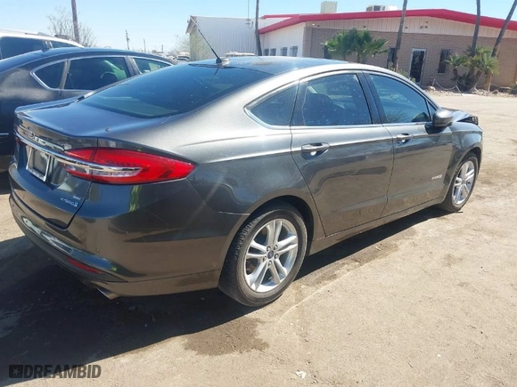 2018 Ford Fusion Hybrid SE with VIN 3FA6P0LU0JR225031, listed as a IAAI auction lot 41668449 with 96,142 mi miles. Bid and sale history available at carsss.com. Image 4.