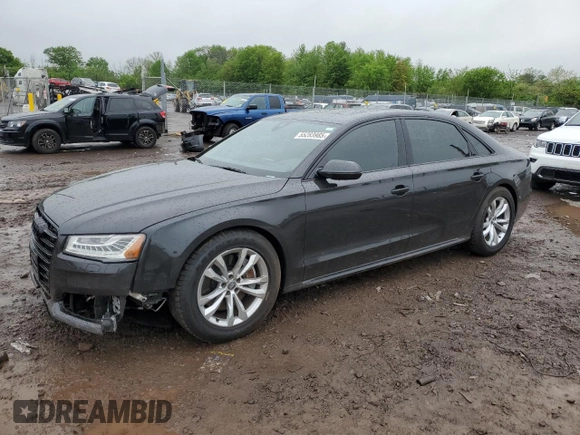 2017 Audi A8 z VIN WAU44AFD0HN004258, wystawiony jako Copart lot #55283985 z przebiegiem 128 059 mil mil oraz Szkoda całkowita • Salvage title. Historia ofert i sprzedaży dostępna na DreamBid. Obrazek 1.