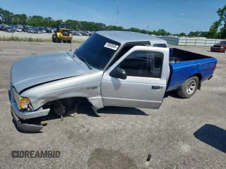 2001 Ford Ranger XL with VIN 1FTYR14U01PA80257, listed as a Copart auction lot 59800065 with 240,047 mi miles and Salvage title. Bid and sale history available at DreamBid. Image 1.