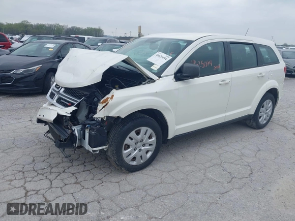 2014 Dodge Journey SE with VIN 3C4PDCAB7ET134454, listed as a IAAI auction lot 41966206 with 145,814 mi miles and . Bid and sale history available at DreamBid. Image 2.