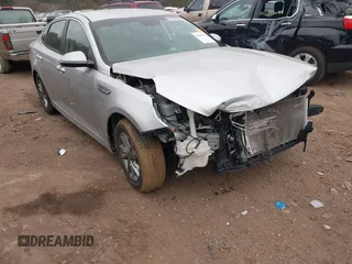2019 Kia Optima LX z VIN 5XXGT4L34KG332883, wystawiony jako IAAI lot #41389571 z przebiegiem 54 280 mil mil oraz . Historia ofert i sprzedaży dostępna na DreamBid. Obrazek 1.