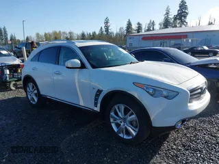 2014 Infiniti QX70 with VIN JN8CS1MW2EM411237, listed as a IAAI auction lot 42011806 with 148,133 mi miles and . Bid and sale history available at carsss.com. Image 13.