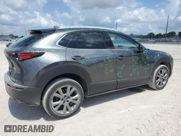 2024 Mazda CX-30 S Premium z VIN 3MVDMBDM4RM615609, wystawiony jako Copart lot #57761055 z przebiegiem 20 721 mil mil oraz Szkoda całkowita • Salvage title. Historia ofert i sprzedaży dostępna na DreamBid. Obrazek 3.
