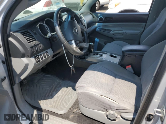2013 Toyota Tacoma with VIN 3TMLU4EN8DM110455, listed as a Copart auction lot 60252235 with 119,702 mi miles and Salvage title. Bid and sale history available at DreamBid. Image 7.