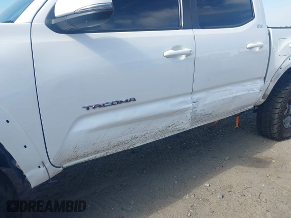 2023 Toyota Tacoma SR with VIN 3TYCZ5AN2PT112854, listed as a IAAI auction lot 42220025 with 43,657 mi miles and . Bid and sale history available at DreamBid. Image 21.