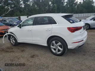 2020 Audi Q3 Premium with VIN WA1AECF32L1030604, listed as a Copart auction lot 57943755 with 61,261 mi miles and Non repairable. Bid and sale history available at DreamBid. Image 2.
