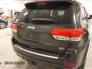 2015 Jeep Grand Cherokee Overland with VIN 1C4RJFCT7FC612930, listed as a IAAI auction lot 41485240 with 189,564 mi miles. Bid and sale history available at carsss.com. Image 16.