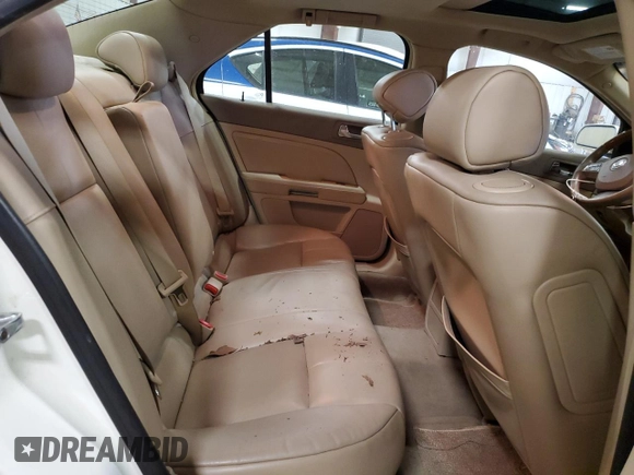 2010 Cadillac STS AWD z VIN 1G6DU6EV0A0106434, wystawiony jako Copart lot #52439915 z przebiegiem 90 187 mil mil oraz Czysty tytuł • Clean title. Historia ofert i sprzedaży dostępna na DreamBid. Obrazek 10.