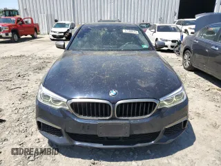 2018 BMW 5 Series M550i xDrive with VIN WBAJB9C56JB286479, listed as a Copart auction lot 57108645 with 71,782 mi miles and Salvage title. Bid and sale history available at DreamBid. Image 5.