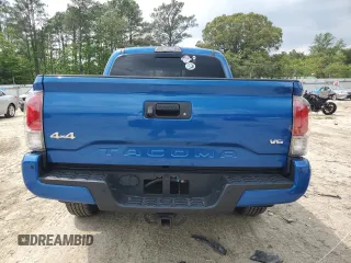 2018 Toyota Tacoma SR z VIN 3TMGZ5AN5JM148719, wystawiony jako Copart lot #56621065 z przebiegiem 34 433 mil mil oraz Szkoda całkowita • Salvage title. Historia ofert i sprzedaży dostępna na DreamBid. Obrazek 6.