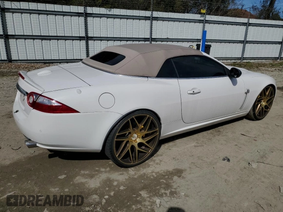2007 Jaguar XK with VIN SAJDA44B775B05606, listed as a Copart auction lot 49419515 with 115,607 mi miles and Salvage Title. Bid and sale history available at DreamBid. Image 3.