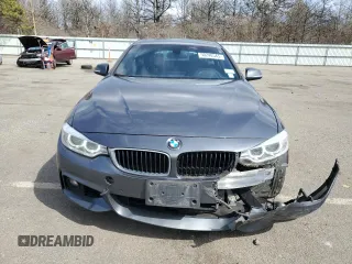 2016 BMW 4 Series 428i xDrive with VIN WBA4C9C50GG137720, listed as a Copart auction lot 50240545 with 60,705 mi miles and Salvage Title. Bid and sale history available at DreamBid. Image 5.