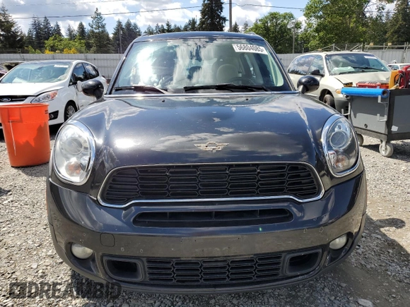 2013 MINI Countryman S ALL4 z VIN WMWZC5C56DWP33270, wystawiony jako Copart lot #56804085 z przebiegiem 141 637 mil mil oraz Szkoda całkowita • Salvage title. Historia ofert i sprzedaży dostępna na DreamBid. Obrazek 5.