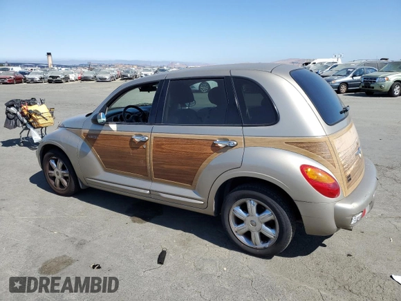 2003 Chrysler PT Cruiser Limited with VIN 3C8FY68B93T551433, listed as a Copart auction lot 61880564 with 136,935 mi miles and Salvage Title. Bid and sale history available at DreamBid. Image 2.