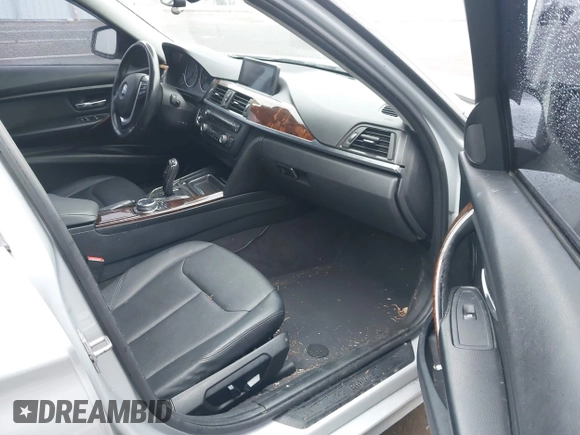 2014 BMW 3 Series 328i with VIN WBA3C1C58EK105766, listed as a IAAI auction lot 41692037 with 156,038 mi miles. Bid and sale history available at carsss.com. Image 5.