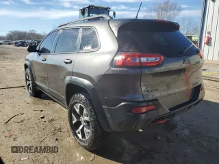 2014 Jeep Cherokee Trailhawk with VIN 1C4PJMBS1EW161642, listed as a Copart auction lot 46672345 with 196,908 mi miles and Salvage Title. Bid and sale history available at carsss.com. Image 2.