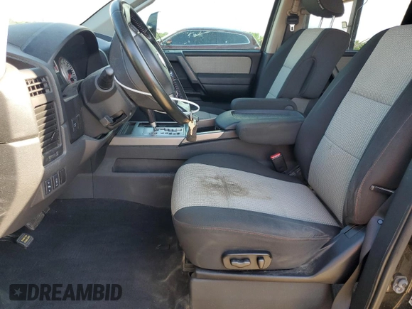 2012 Nissan Titan SV with VIN 1N6BA0EC6CN312465, listed as a Copart auction lot 58722815 with 186,207 mi miles and Salvage title. Bid and sale history available at DreamBid. Image 7.